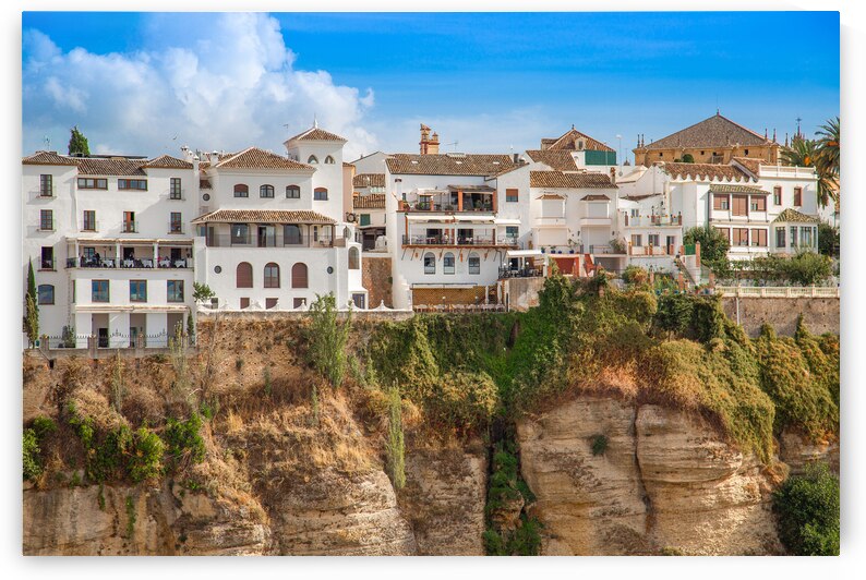 Famous Ronda restaurants and colonial houses overlooking the sce by Elijah Lovkoff