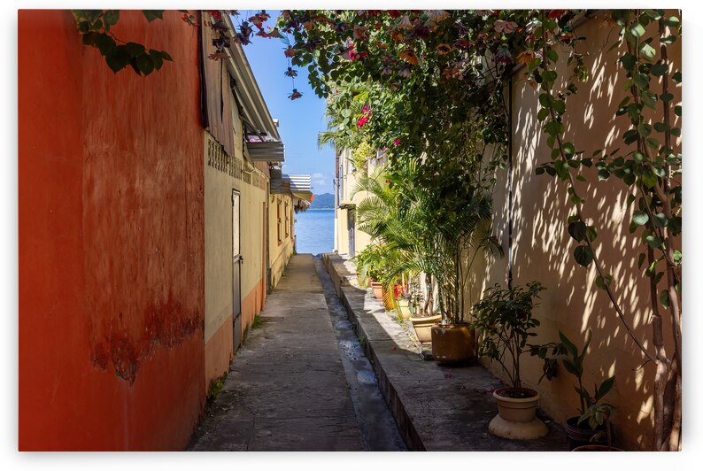 Colorful colonial architecture of historic center of Flores Guatemala by Elijah Lovkoff