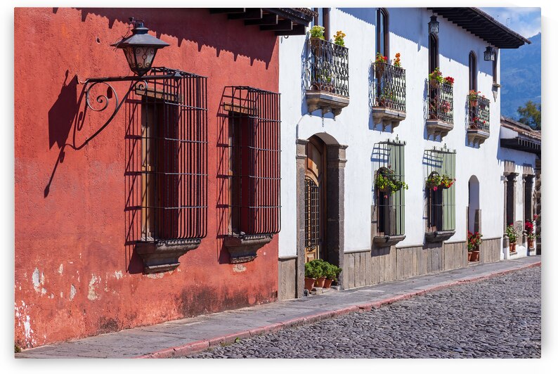 Guatemala colorful colonial Antigua streets in historic city center Barrio Historico by Elijah Lovkoff