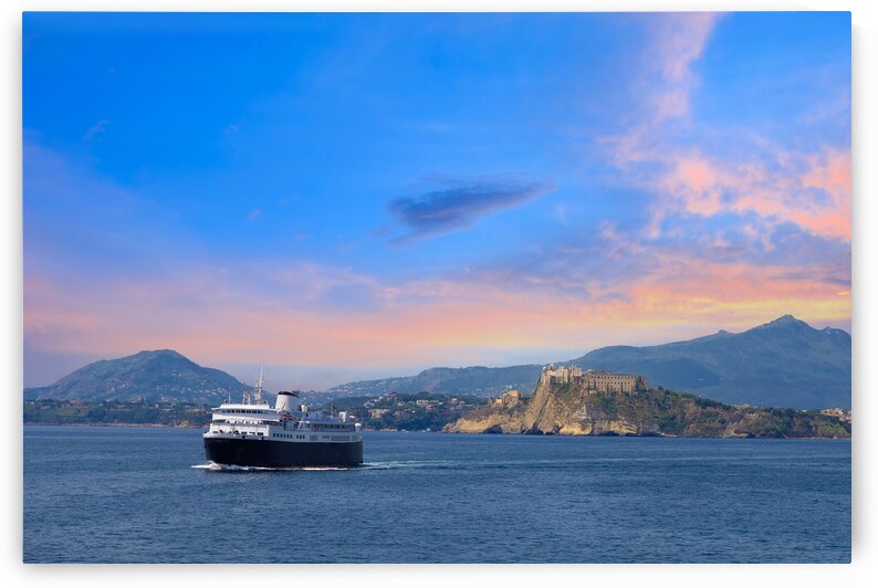 Italy scenic sunset over Procida Island near Naples with boat approaching it from afar by Elijah Lovkoff