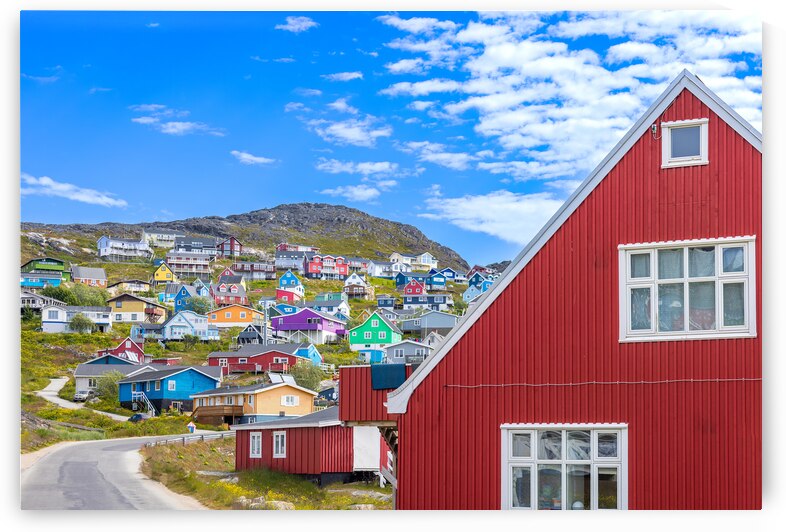 Typical architecture of Greenland city Qarqotoq with colored houses located near fjords and icebergs by Elijah Lovkoff