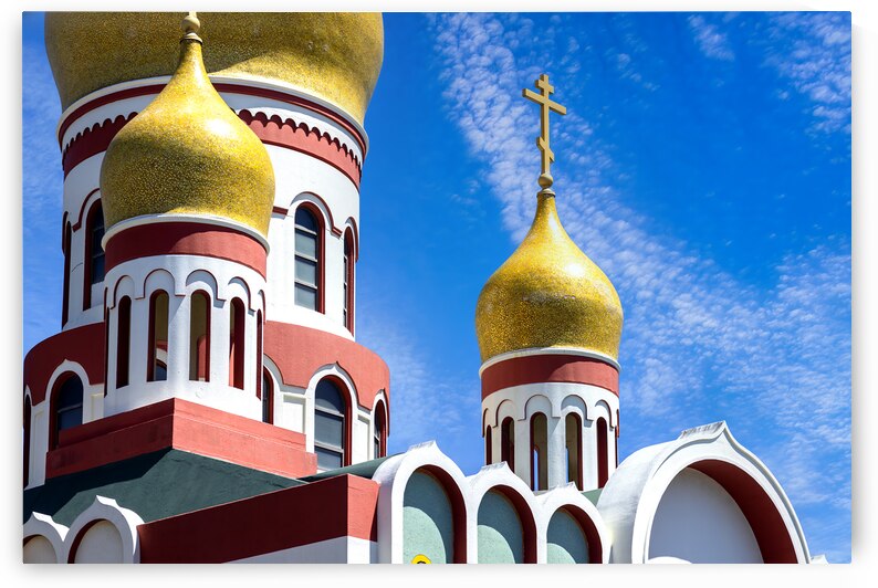 Holy Virgin Cathedral Russian Orthodox church with gold domes and a cross on top in San Francisco by Elijah Lovkoff