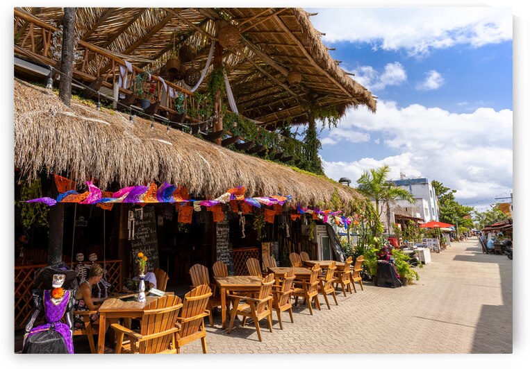Cafes pubs and restaurants of the tropical island Isla Mujeres located across the Gulf of Mexico a short ride on the ferry from Cancun by Elijah Lovkoff