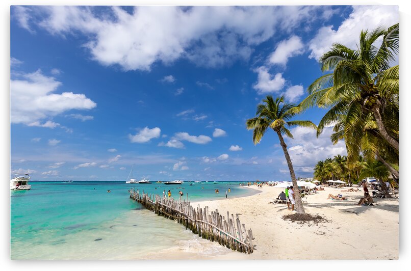 Serene turquoise Isla Mujeres beach Playa Norte famous for emerald waters sandy sea shore and beach bars for fun and beach parties by Elijah Lovkoff