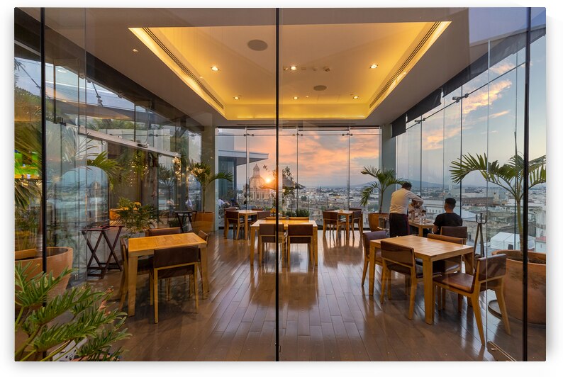 Dinner at a restaurant in a trendy hotel overlooking scenic panoramic view of the main Guadalajara square and Guadalajara Cathedral and city skyline by Elijah Lovkoff