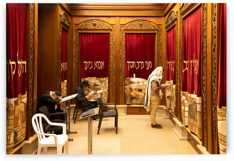 Orthodox jews is praying in synagogue near Sacred Western Wailing Wall in Jerusalem Old City by Elijah Lovkoff