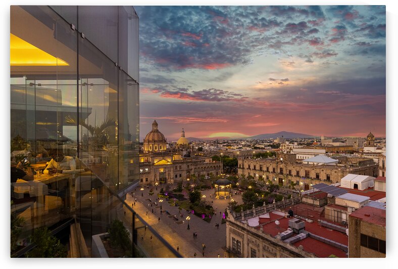 Dinner at a restaurant in a trendy hotel overlooking scenic panoramic view of the main Guadalajara square and Guadalajara Cathedral and city skyline by Elijah Lovkoff