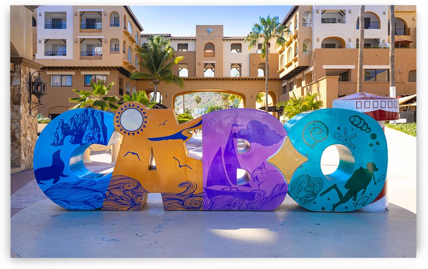 Los Cabos colorful letters in Cabo San Lucas marina a departure point for cruises marlin fishing and lancha boats to El Arco Arch and beaches by Elijah Lovkoff