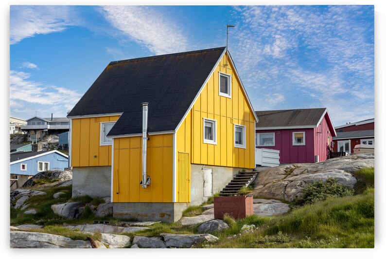 Typical architecture of Greenland Ilulissat with colored houses located near fjords and icebergs by Elijah Lovkoff