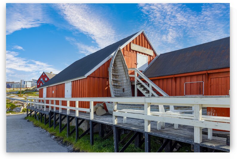 Typical architecture of Greenland Ilulissat with colored houses located near fjords and icebergs by Elijah Lovkoff