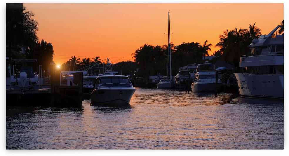 Private yachts and sailboats in Fort Lauderdale canals in Florid by Elijah Lovkoff