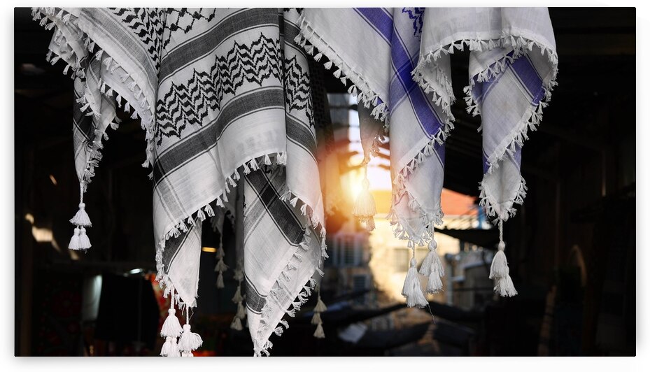 Keffiyeh arab headdress and symbol of Palestinian resistance in Jerusalem market by Elijah Lovkoff