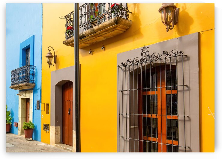 Oaxaca Mexico Scenic old city streets and colorful colonial buildings in historic city center by Elijah Lovkoff