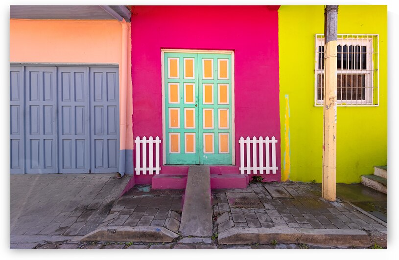 Colorful colonial architecture of historic center of Flores Guatemala by Elijah Lovkoff