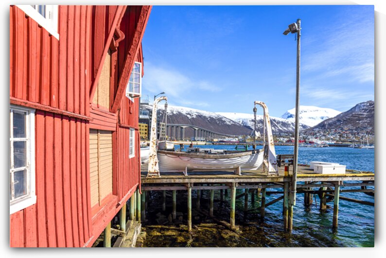Norway Tromso famous tourist travel destination known for northern lights aurora borealis viewing by Elijah Lovkoff