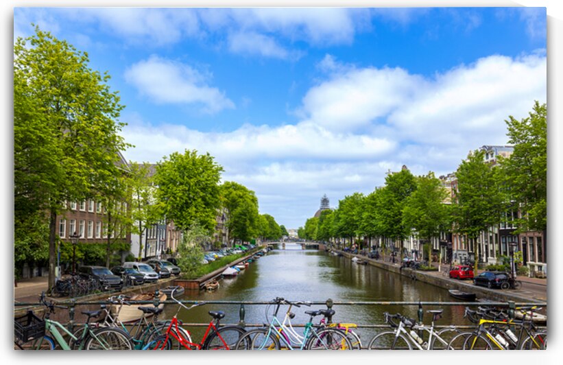 Holland Amsterdam canals with scenic bridges and historic city center UNESCO World Heritage site by Elijah Lovkoff