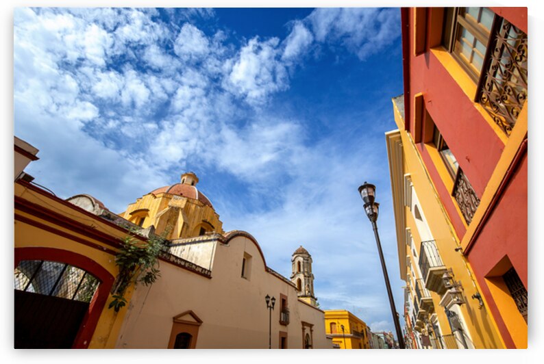 Oaxaca Mexico Scenic old city streets and colorful colonial buildings in historic city center by Elijah Lovkoff