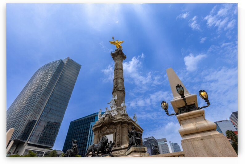 Mexico City tourist attraction Angel of Independence column near financial center and El Zocalo by Elijah Lovkoff