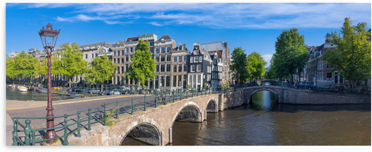 Holland Amsterdam canals with boats scenic bridges and historic city center UNESCO World Heritage site by Elijah Lovkoff