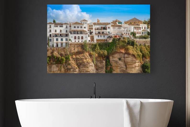 Famous Ronda restaurants and colonial houses overlooking the sce by Elijah Lovkoff
