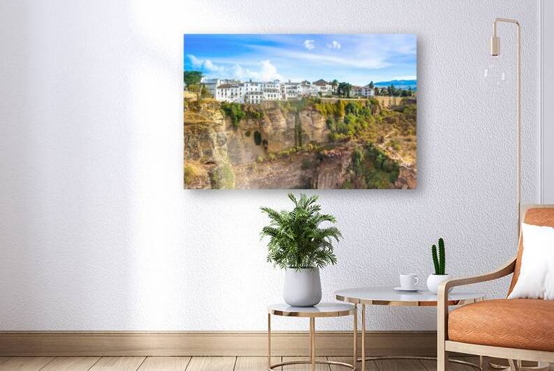 Famous Ronda restaurants and colonial houses overlooking the sce by Elijah Lovkoff