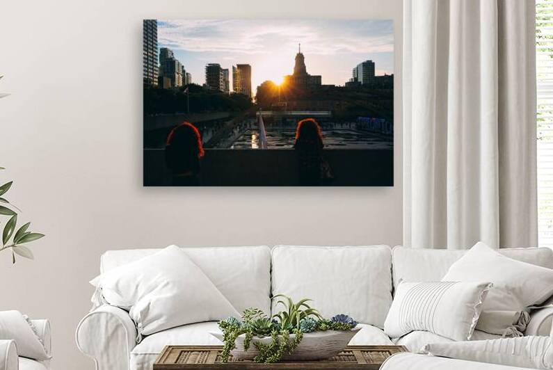 TORONTO CANADA MARCH 16 2017: Tourists enjoying a sunset on To by Elijah Lovkoff