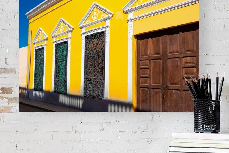 Scenic colorful colonial Merida streets in Mexico Yucatan by Elijah Lovkoff