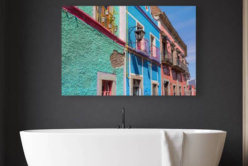 Scenic cobbled streets and traditional colorful colonial architecture in Guanajuato historic city center by Elijah Lovkoff