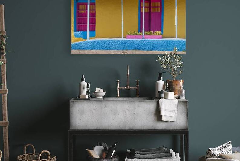 Colorful colonial architecture of historic center of Flores Guatemala by Elijah Lovkoff