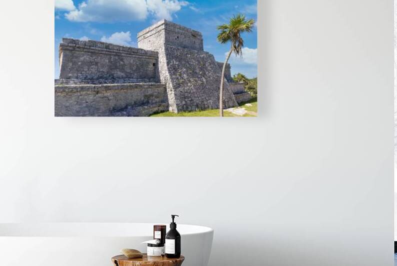 Temple of the God of Wind in Tulum Archaeological Zone with Mayan pyramids and ruins located on the scenic ocean shore of Quintana Roo province by Elijah Lovkoff