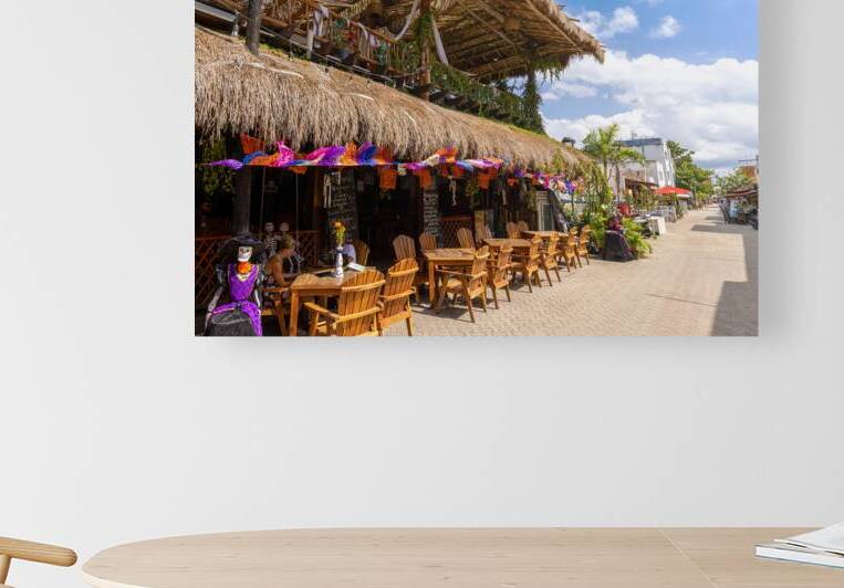 Cafes pubs and restaurants of the tropical island Isla Mujeres located across the Gulf of Mexico a short ride on the ferry from Cancun by Elijah Lovkoff