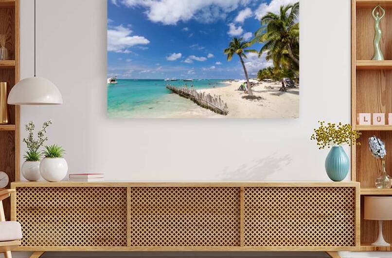 Serene turquoise Isla Mujeres beach Playa Norte famous for emerald waters sandy sea shore and beach bars for fun and beach parties by Elijah Lovkoff