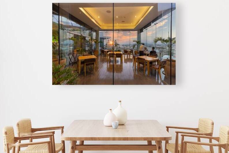 Dinner at a restaurant in a trendy hotel overlooking scenic panoramic view of the main Guadalajara square and Guadalajara Cathedral and city skyline by Elijah Lovkoff