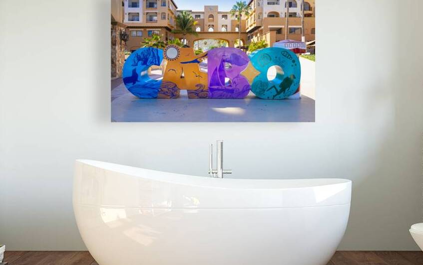 Los Cabos colorful letters in Cabo San Lucas marina a departure point for cruises marlin fishing and lancha boats to El Arco Arch and beaches by Elijah Lovkoff