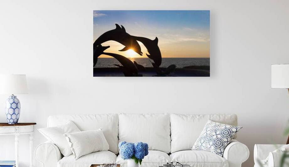 Dolphine silhouettes at Mazatlan sea promenade El Malecon with ocean lookouts tourist beaches and scenic landscapes. It connects Old Mazatlan with Hotel Zone Zona Hotelera by Elijah Lovkoff
