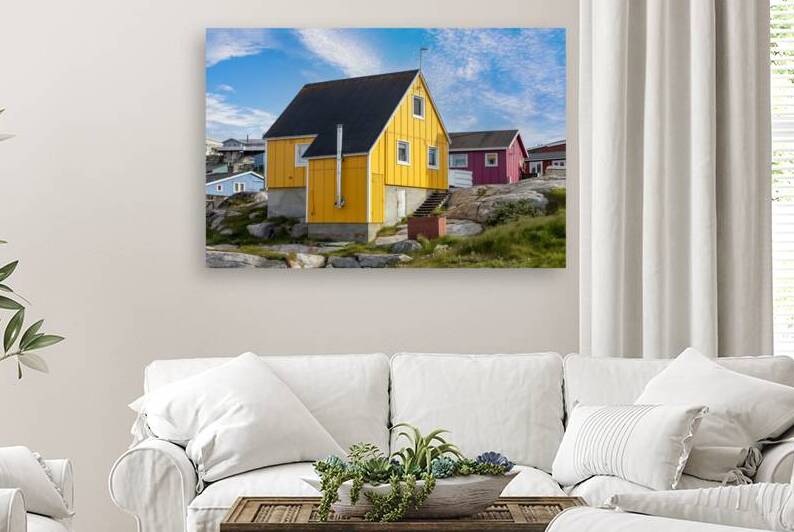 Typical architecture of Greenland Ilulissat with colored houses located near fjords and icebergs by Elijah Lovkoff