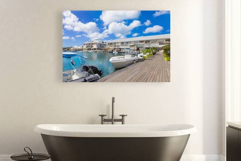Saint Martin Marigot waterfront marina with yachts restaurants and water sport activity by Elijah Lovkoff