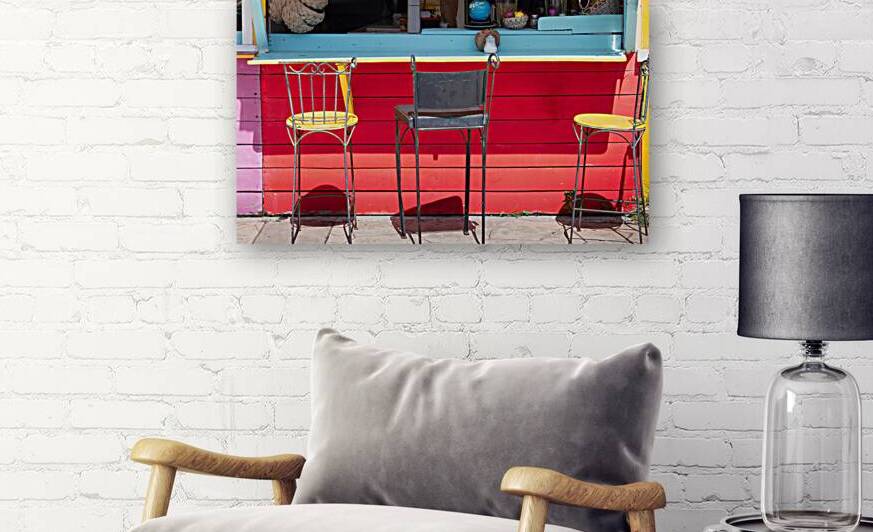Caribbean cruise vacation. Colorful street cafe in Marigot in Saint Martin by Elijah Lovkoff