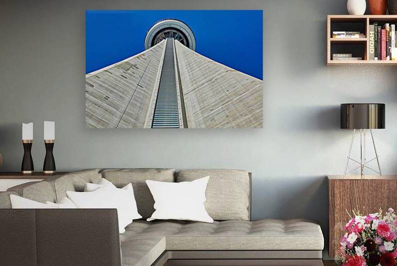 Toronto Canada 26 July 2018: Famous CN Tower overlooking Ontario Lake by Elijah Lovkoff