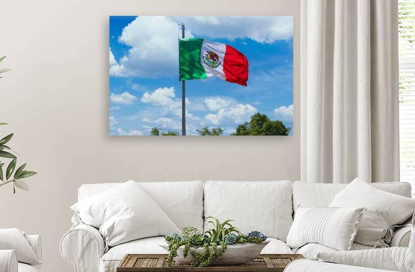 Los Cabos Mexico Mexican tricolor national striped flag proudly waving at mast in the air with Aztec symbol for Tenochtitlan by Elijah Lovkoff