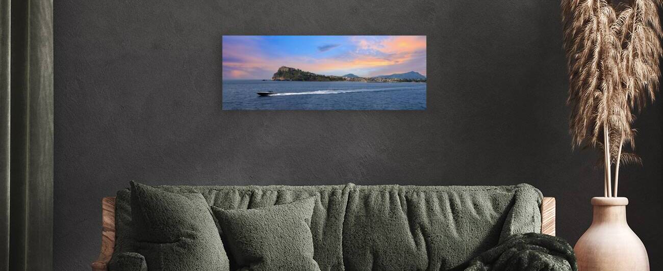 Italy scenic sunset over Procida Island near Naples with boat a by Elijah Lovkoff