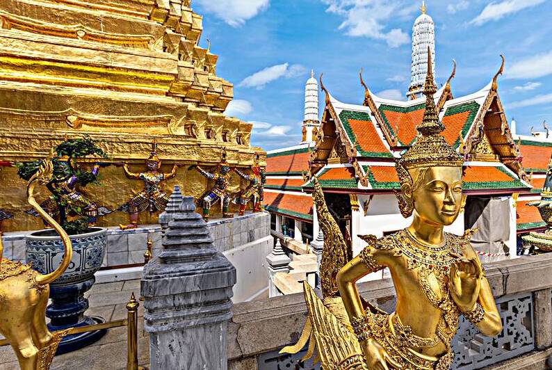 Scenic golden temple of emerald buddha Wat Phra Kaew in Bangkok Thailand by Elijah Lovkoff