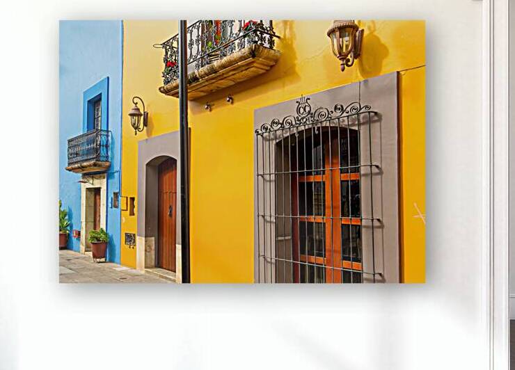 Oaxaca Mexico Scenic old city streets and colorful colonial buildings in historic city center by Elijah Lovkoff