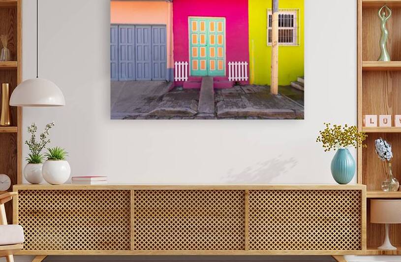 Colorful colonial architecture of historic center of Flores Guatemala by Elijah Lovkoff