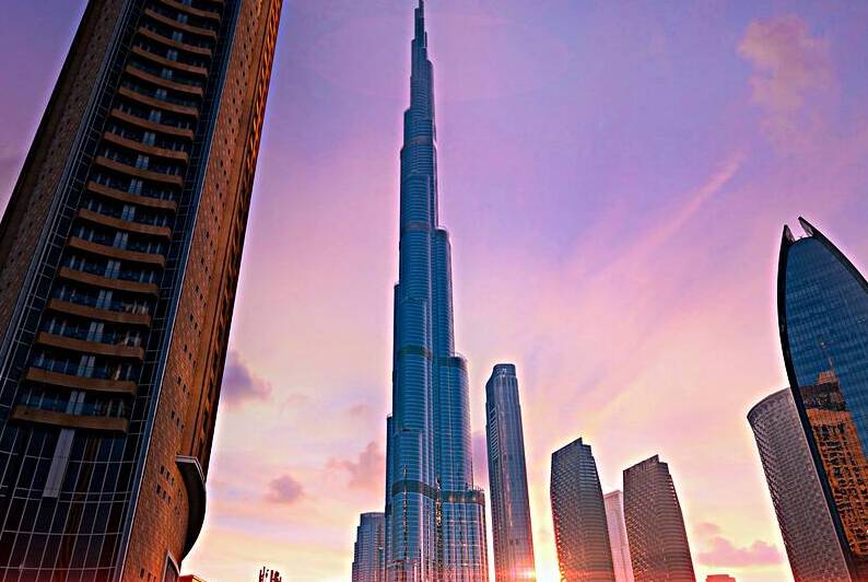 UAE Dubai downtown financial skyline and business shopping center near Dubai Mall by Elijah Lovkoff