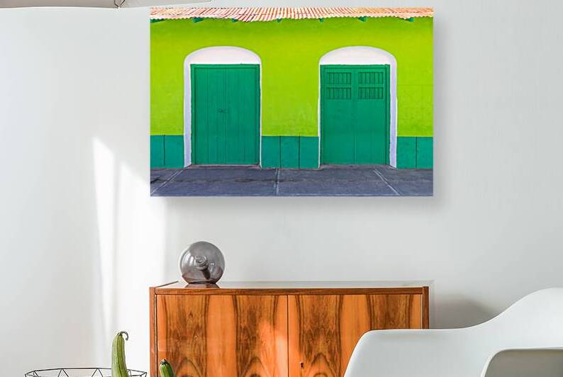 Colorful colonial architecture of historic center of Flores Guatemala by Elijah Lovkoff