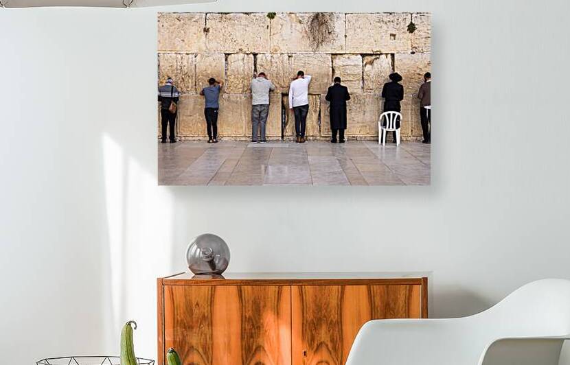Orthodox and secular jews pray near Sacred Western Wailing Wall in Jerusalem Old City by Elijah Lovkoff