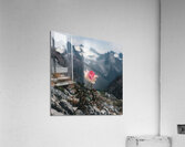 nestled amidst a rugged mountain landscape a soli Acrylic Print