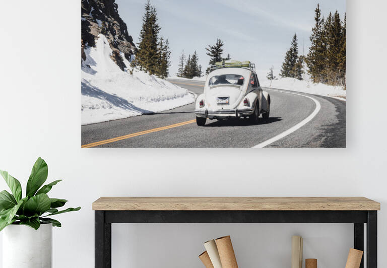 Volkswagen Bug Drives Through the Mountains by Aperture Adventure Delaney Van