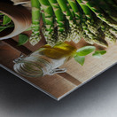 311 fresh thin green asparagus on a wooden table. Metal print